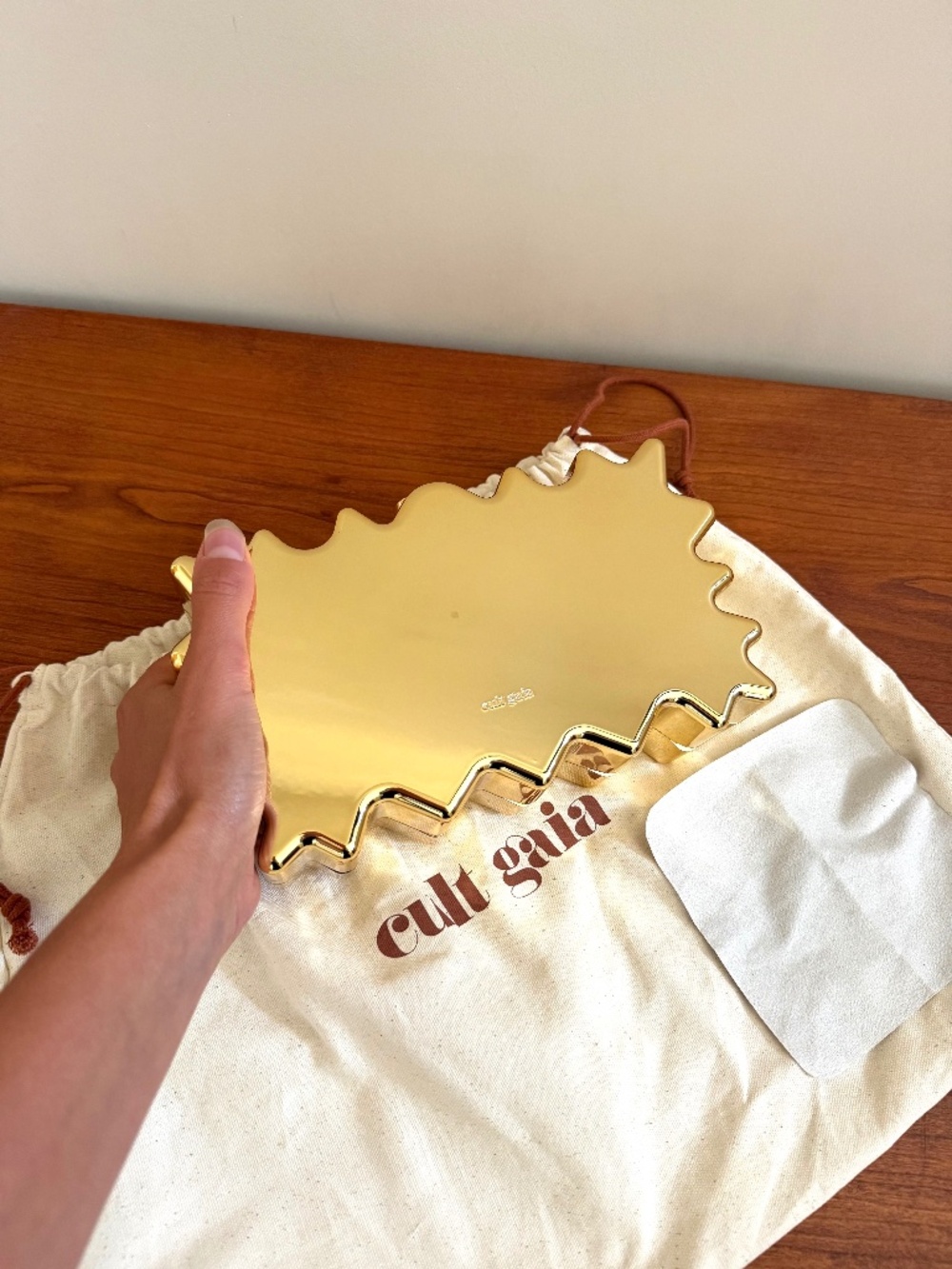 Gold Cult Gaia clutch